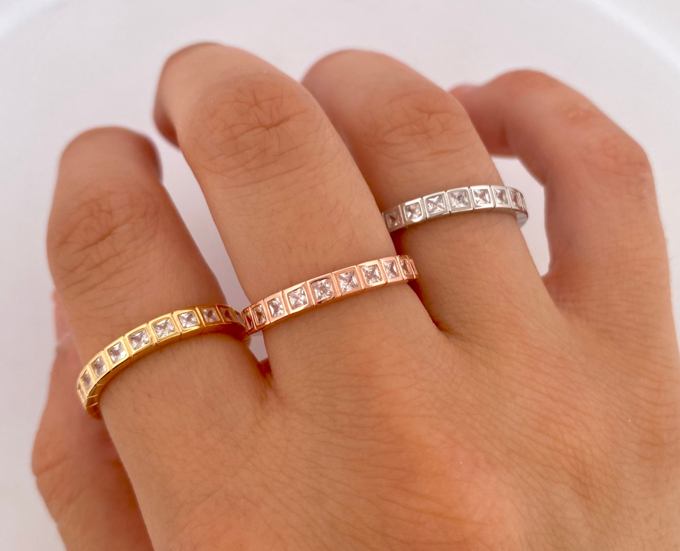 ETERNITY RING WITH SQUARE STONES