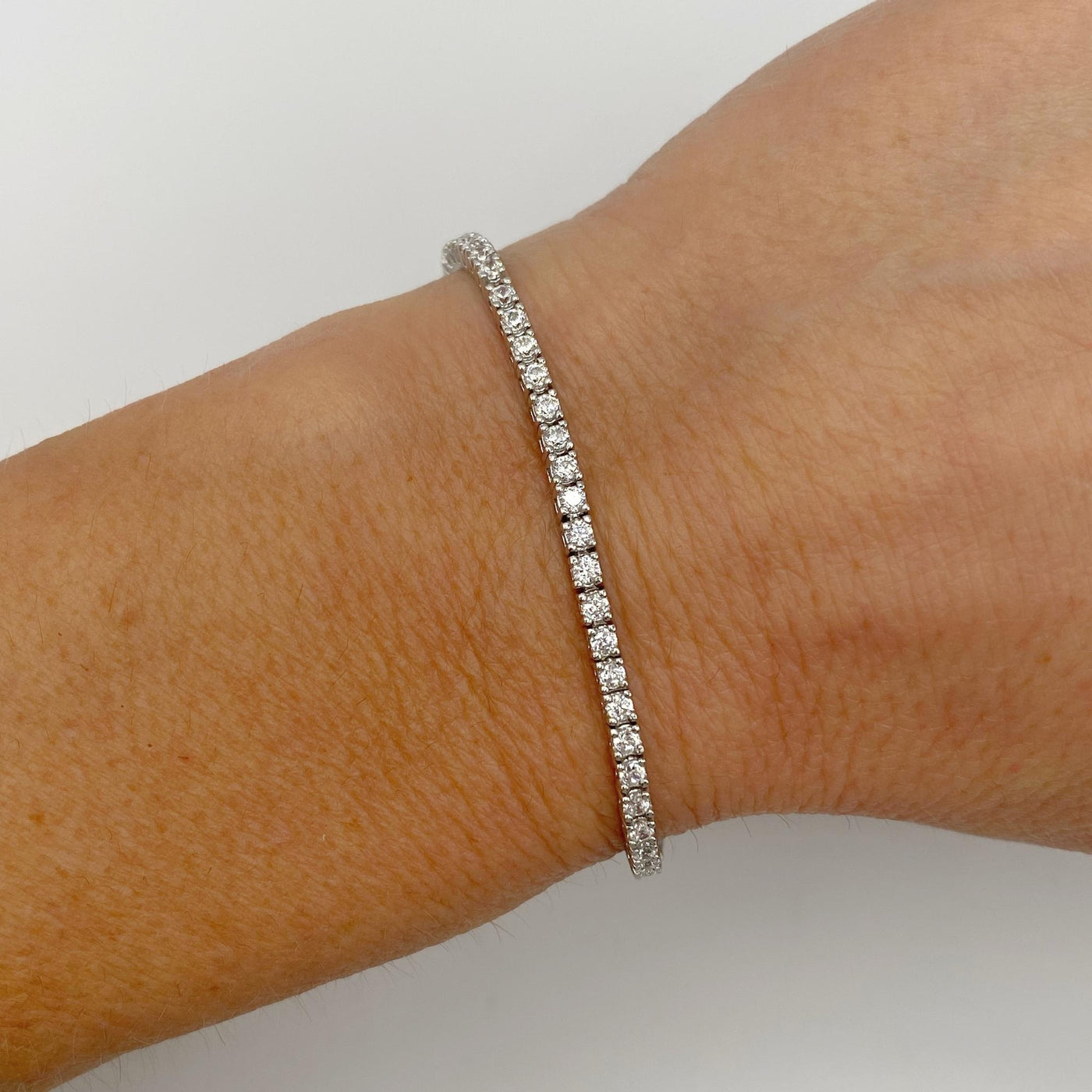 Silver casting tennis bracelet with white round stones - 2 mm
