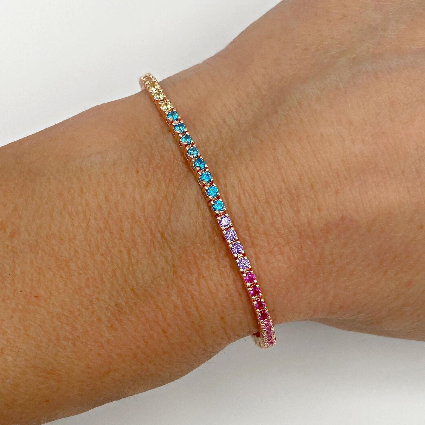 Silver casting tennis bracelet with rainbow stones - 2 mm