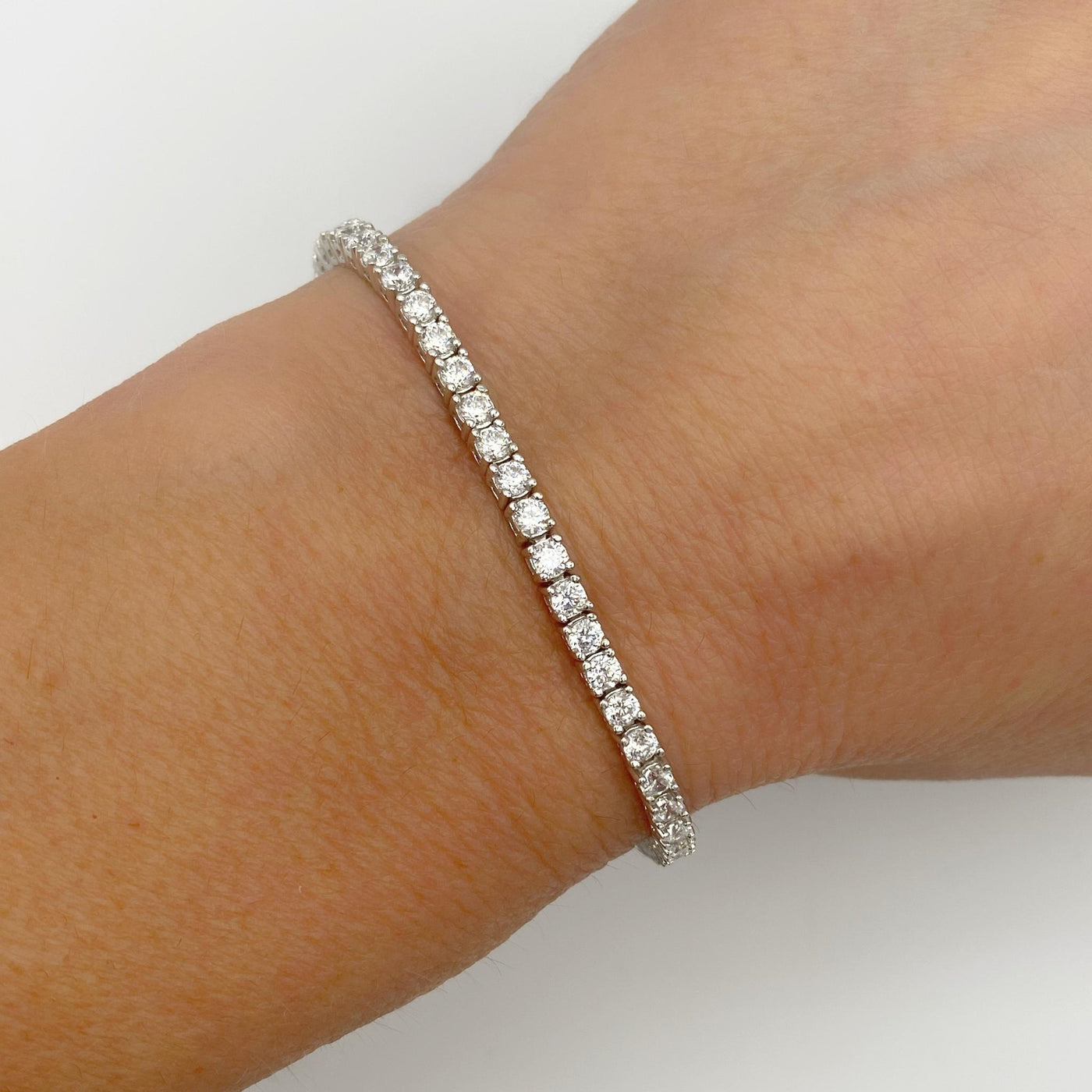 Silver casting tennis bracelet with white round stones - 2.5 mm