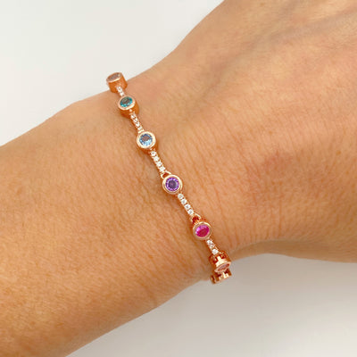 Silver tennis bracelet with rainbow round stones