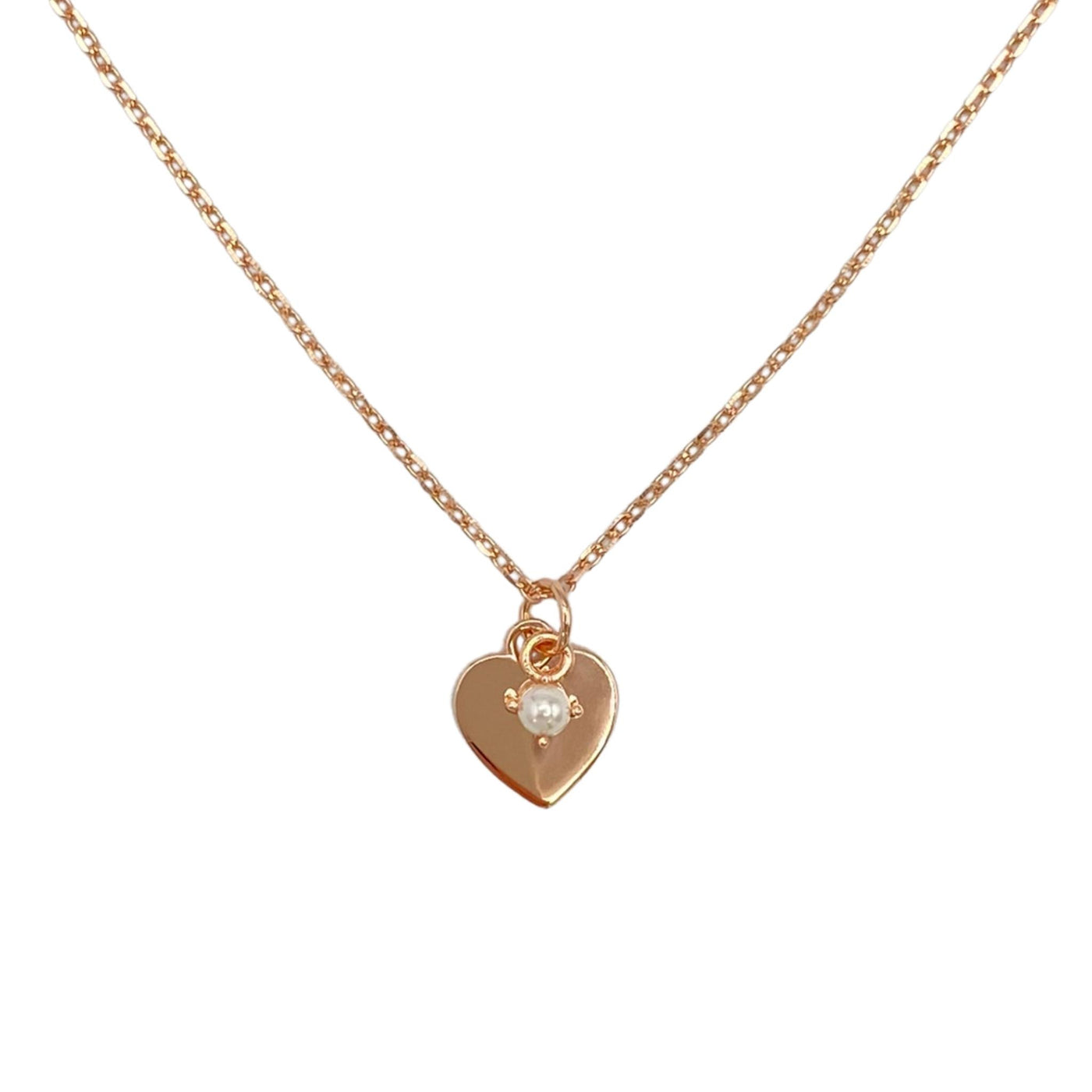 Silver necklace with heart and pearl charms